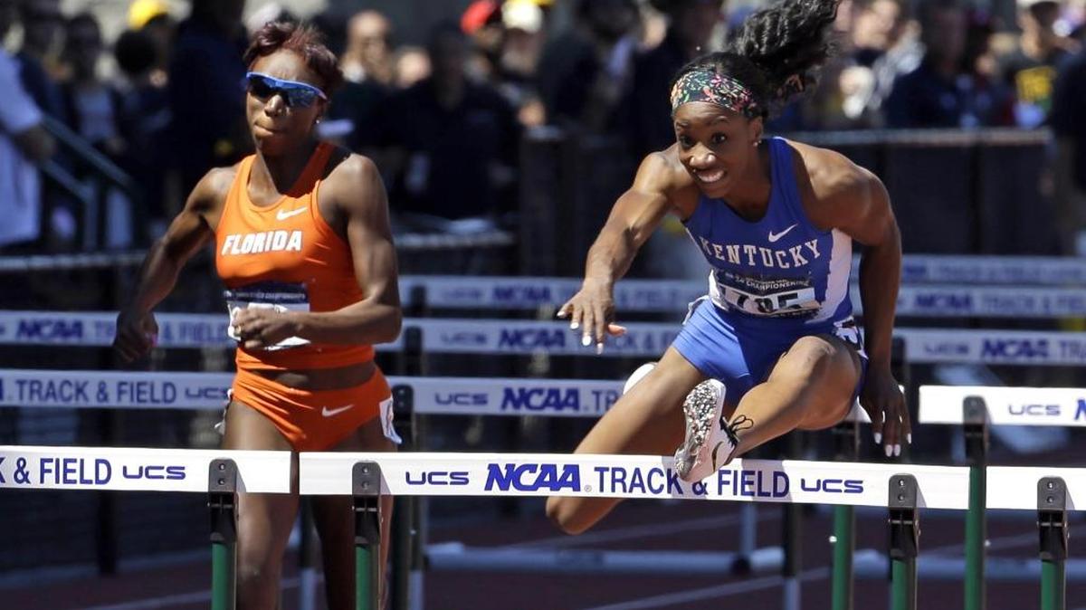 Kentucky s Kendra Harrison, right, led Florida’s Bridgette Owens over the last hurdle to win the 100-meter hurdles at the NCAA track and field championships in Eugene, Ore., on June 13, 2015.