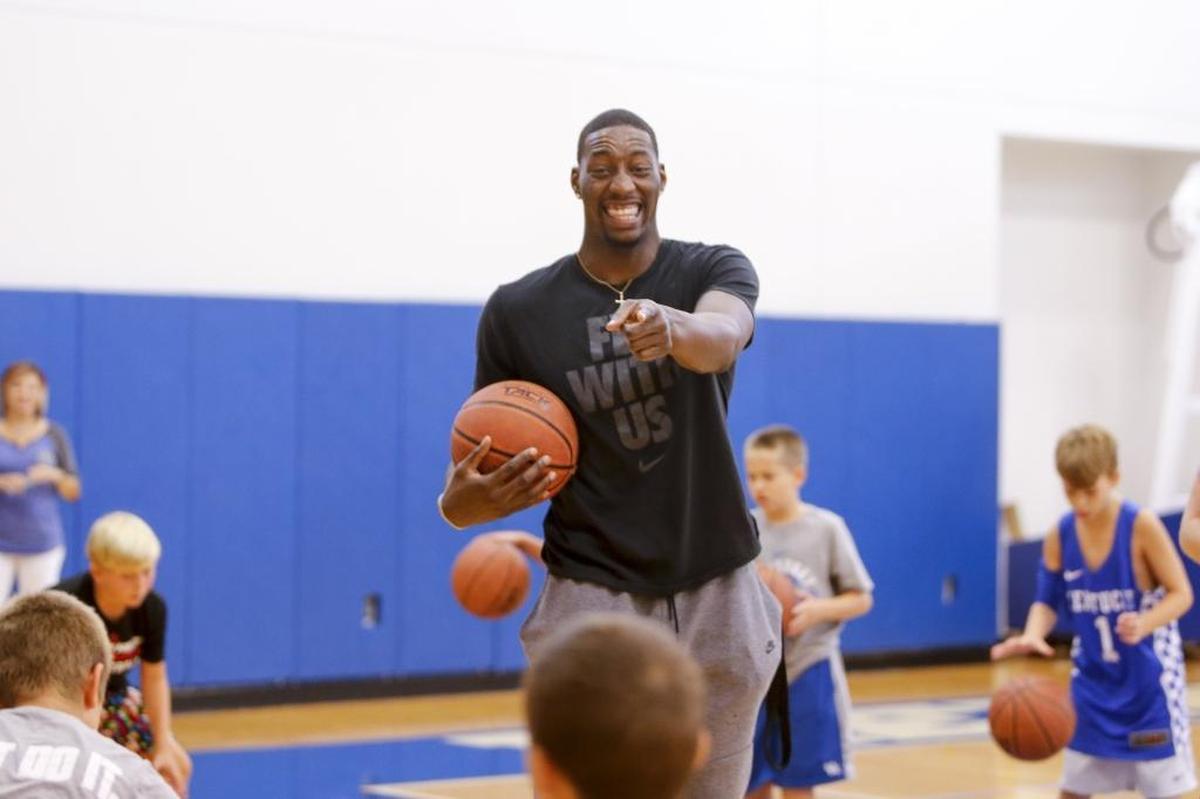 Former UK Basketball players Bam Adebayo dribbles with the kids as he takes part in the 2017 John Calipari UK Pro Camps at the Joe Craft Center in Lexington, Ky., on Wednesday, August 2, 2017.
