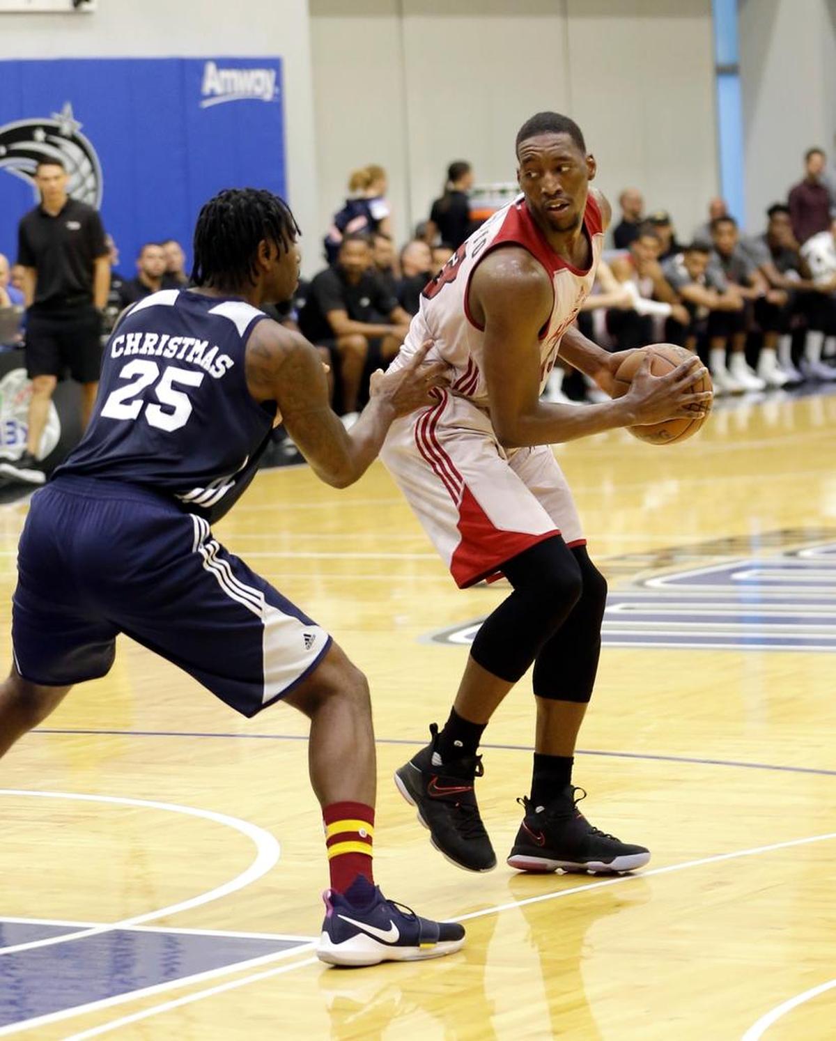 The Miami Heat’s Bam Adebayo, right, looks for a way around the Indiana Pacers’ Rakeem Christmas (25) during the second half of an NBA summer league basketball game, Monday, July 3, 2017, in Orlando, Fla.