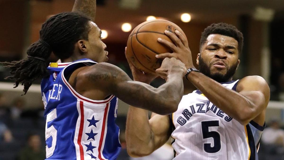 Memphis Grizzlies guard Andrew Harrison, right, drives against Philadelphia 76ers guard Anthony Barber during the second half of a preseason NBA basketball game Tuesday, Oct. 11, 2016, in Memphis, Tenn. The Grizzlies won 121-91.