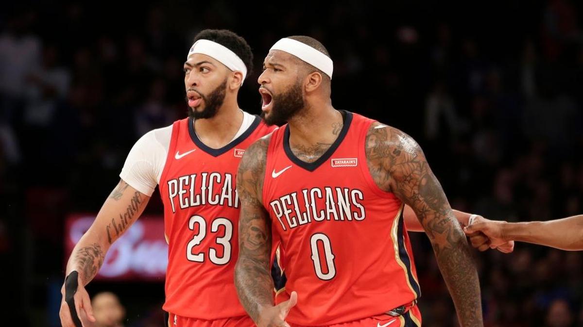 The New Orleans Pelicans’ Anthony Davis, left, and DeMarcus Cousins reacted after Davis scored the tying basket during the second half against the New York Knicks on Jan. 14 in New York.