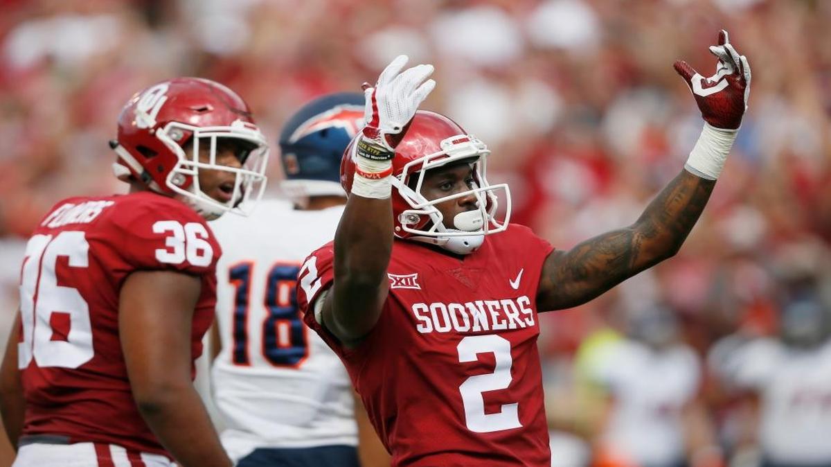 Oklahoma wide receiver Jeff Badet (2) gestures to the crowd Oklahoma quarterback Baker Mayfield (6) is pictured during an NCAA college football game between UTEP and Oklahoma in Norman, Okla., Saturday, Sept. 2, 2017.