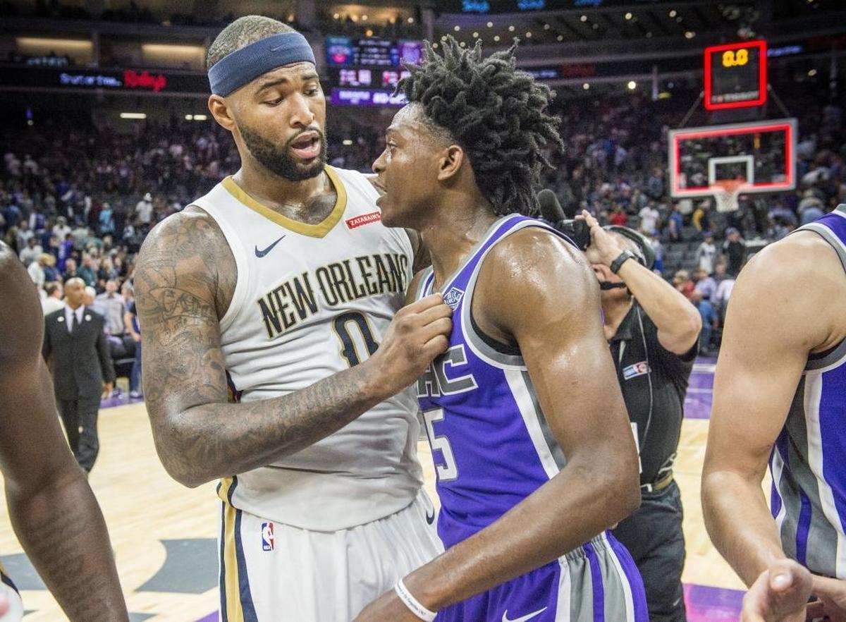 Former University of Kentucky standouts DeAaron Fox, right, of the Sacramento Kings and DeMarcus Cousins of the New Orleans Pelicans chatted after a game earlier this season.
