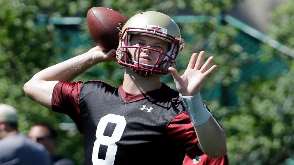 Boston College quarterback Patrick Towles throws a football during football practice, Monday, Aug. 8, 2016, in Boston.