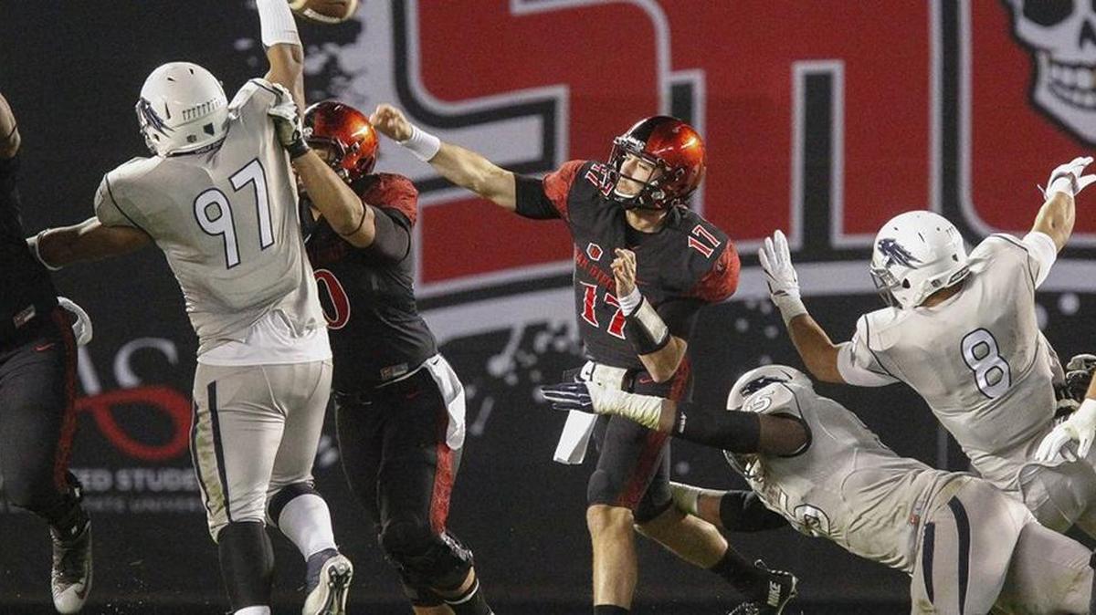 San Diego State quarterback Maxwell Smith threw a pass during the first quarter against Nevada.