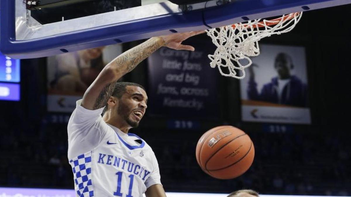 Kentucky’s Mychal Mulder dunked over Asbury’s Alex Dennis on Nov. 6, 2016.