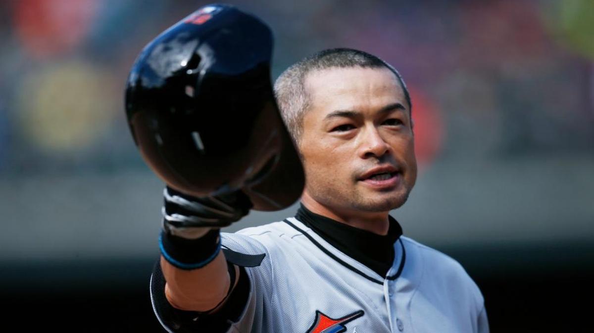 The Miami Marlins’ Ichiro Suzuki tips his batting helmet to the crowd as fans applaud after he hit a triple off Colorado Rockies relief pitcher Chris Rusin in the seventh inning of a baseball game, Sunday, Aug. 7, 2016, in Denver. The hit was the 3,000th in his major league career.