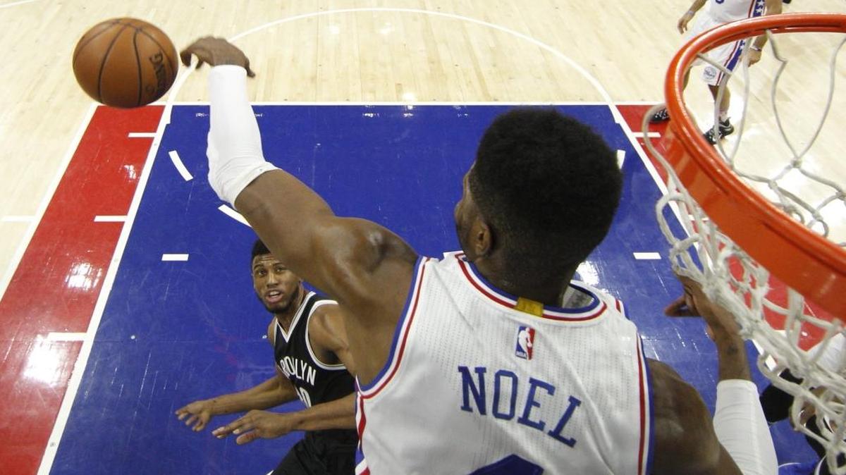 The Nets’ Thaddeus Young (30) watched as the 76ers' Nerlens Noel (4) blocked his shot, but a foul call negated the play on Feb. 6, 2016, in Philadelphia. The 76ers won 103-98.