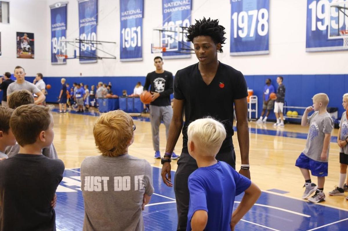 Former UK Basketball player De’Aaron Fox talks with campers as he takes part in the 2017 John Calipari UK Pro Camps at the Joe Craft Center in Lexington, Ky., on Tuesday, August 1, 2017.