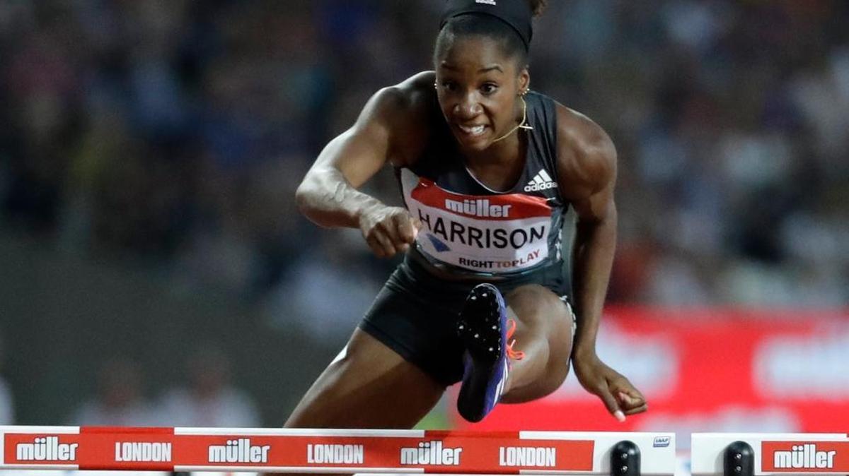 Kendra Harrison of the US clears the final hurdle as she runs on to win the women's 100 meter hurdles in a world record time of 12.20 seconds during the Diamond League anniversary games at The Stadium, in the Queen Elizabeth Olympic Park in London, Friday, July 22, 2016.