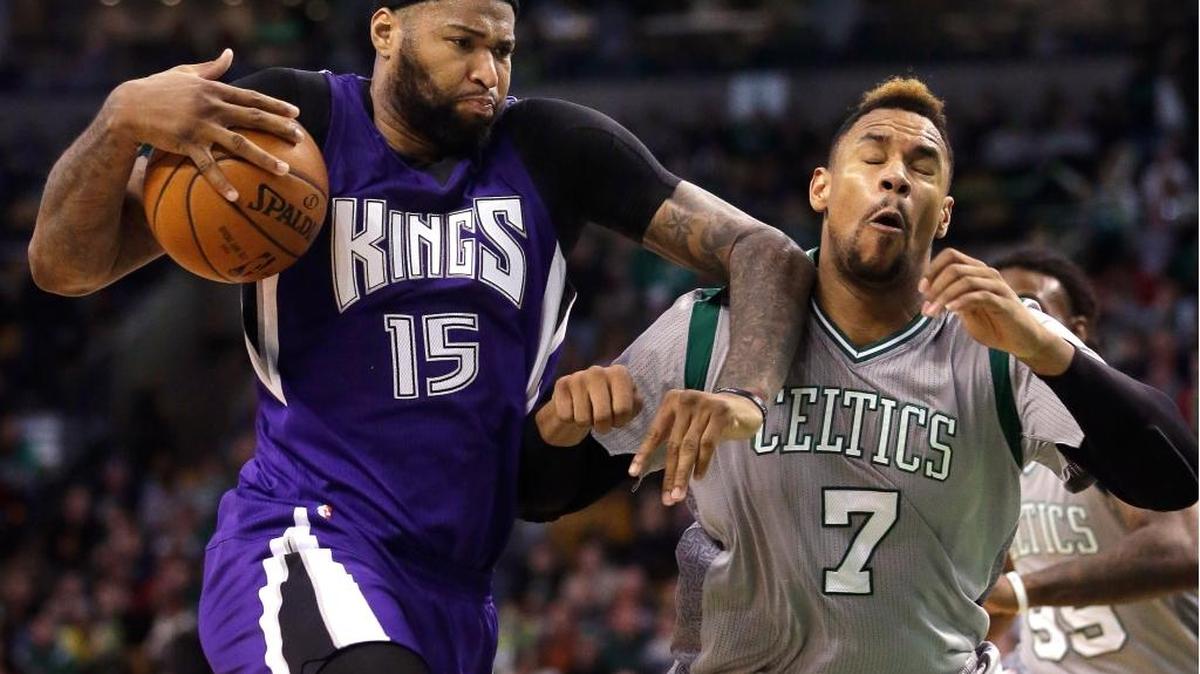 Kings center DeMarcus Cousins drove toward the basket against Celtics center Jared Sullinger in the fourth quarter on Sunday, Feb. 7, 2016, in Boston.