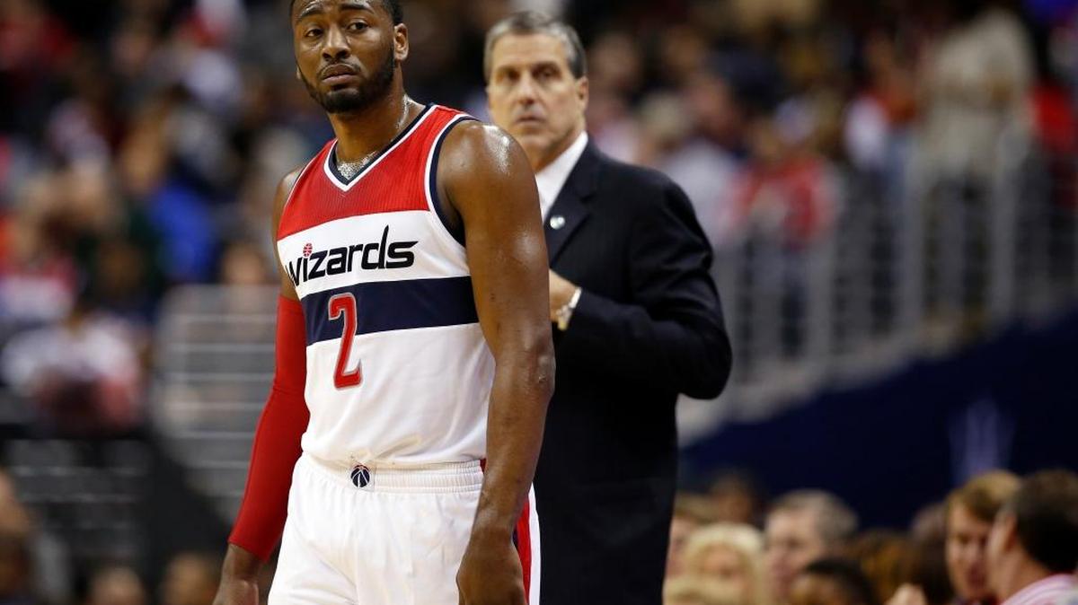 Wizards guard John Wall stood with head coach Randy Wittman behind him during the second half against the Pacers on Tuesday, Nov. 24, 2015, in Washington. The Pacers won 123-106.