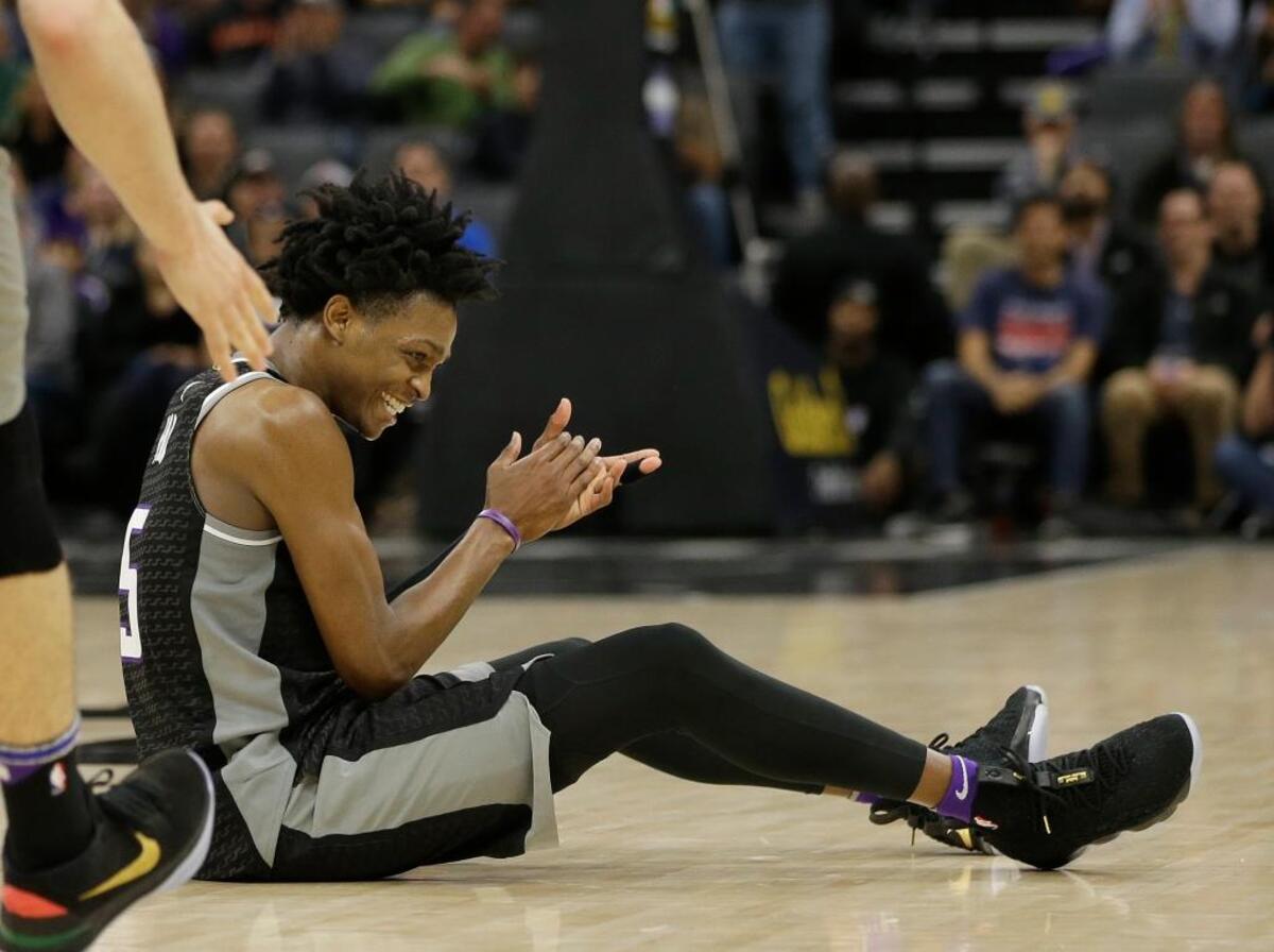 De’Aaron Fox celebrated after the forcing the Nets to commit a turnover in the closing moments of the Kings' 116-111 overtime win Thursday.