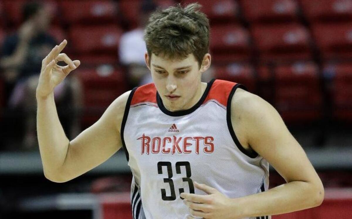Houston Rockets' Kyle Wiltjer reacts after scoring against the Sacramento Kings during the first half of an NBA summer league basketball game, Sunday, July 10, 2016, in Las Vegas.