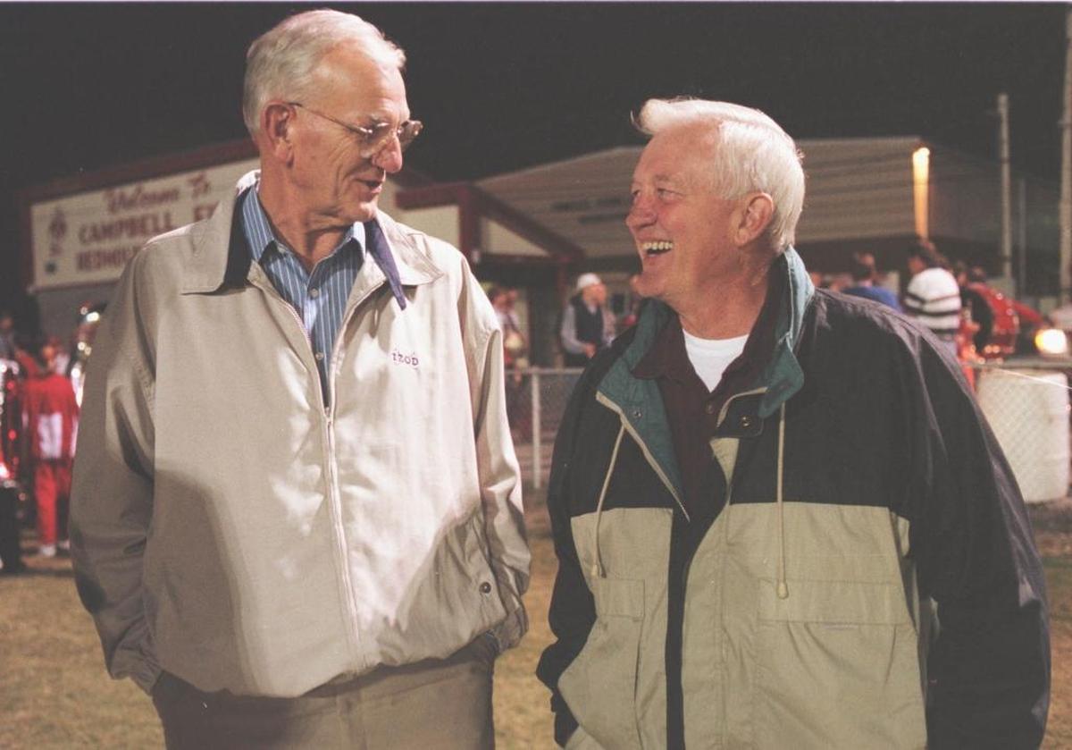 Two of Corbin’s all-time greats, Jerry Bird, left, and Tommy Atkins, talked before Corbin’s football team played Wayne County Oct. 16, 1998.