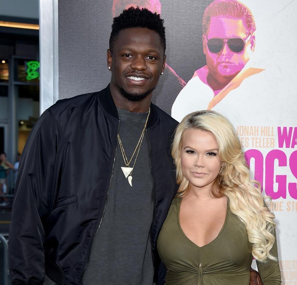 NBA player Julius Randle, of the Los Angeles Lakers, left, and Kendra Shaw arrive at the Los Angeles premiere of "War Dogs" at the TCL Chinese Theatre on Monday, Aug. 15, 2016.