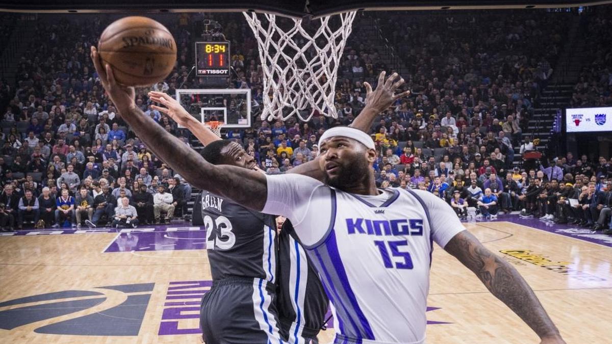 Sacramento Kings forward DeMarcus Cousins (15) goes to the basket against the Golden State Warriors forward Draymond Green (23) during their game at Golden 1 Center in Sacramento, California on Saturday, February 4, 2017.