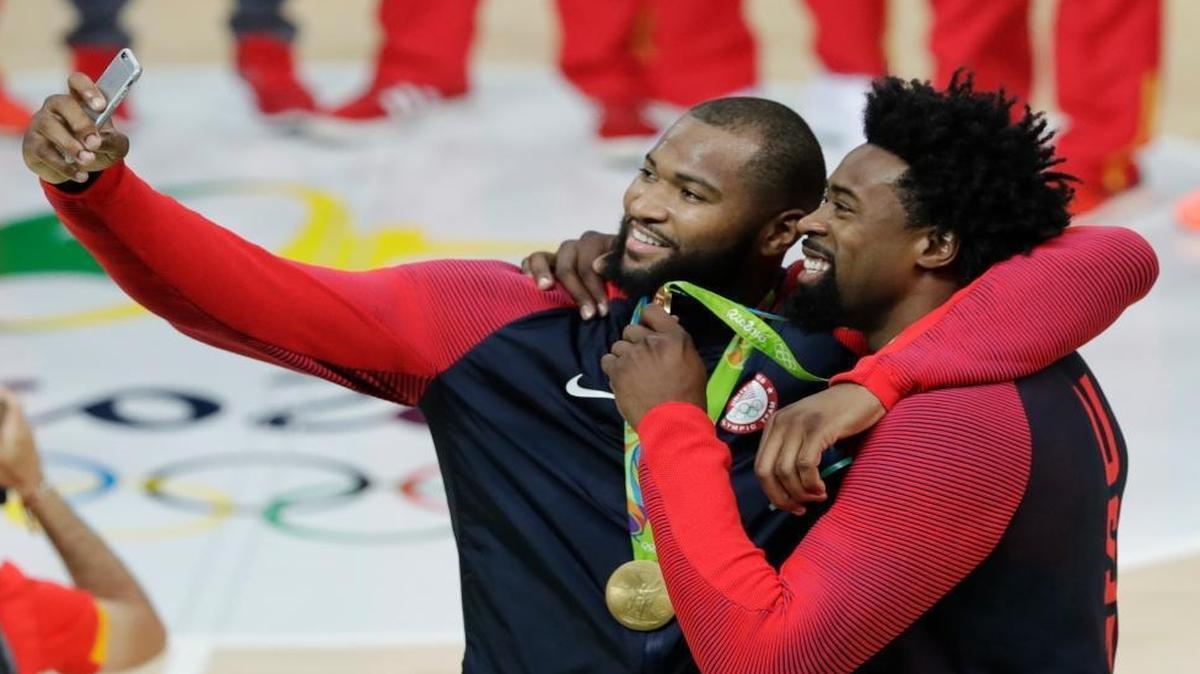 The United States’ DeMarcus Cousins and DeAndre Jordan took a selfie with their gold medals for men’s basketball at the Olympics in Rio de Janeiro, Brazil, on Sunday, Aug. 21, 2016.