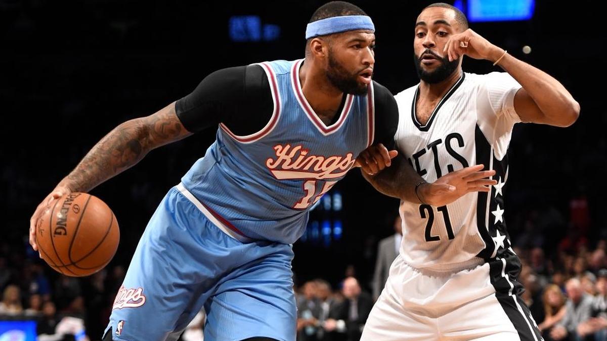 Kings center DeMarcus Cousins (15) drove past Nets guard Wayne Ellington during the first half on Friday, Feb. 5, 2016, in New York.