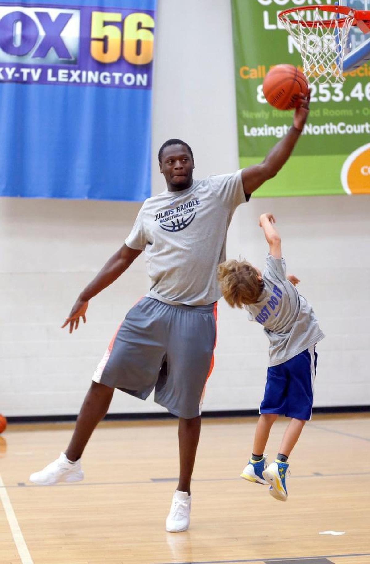 Julius Randle jokingly blocked a shot by Braxton Cornell, 9, at a basketball camp Randle in 2015. Julius Randle became a father in December 2016 when his fiance gave birth to their first son, Kyden Randle.