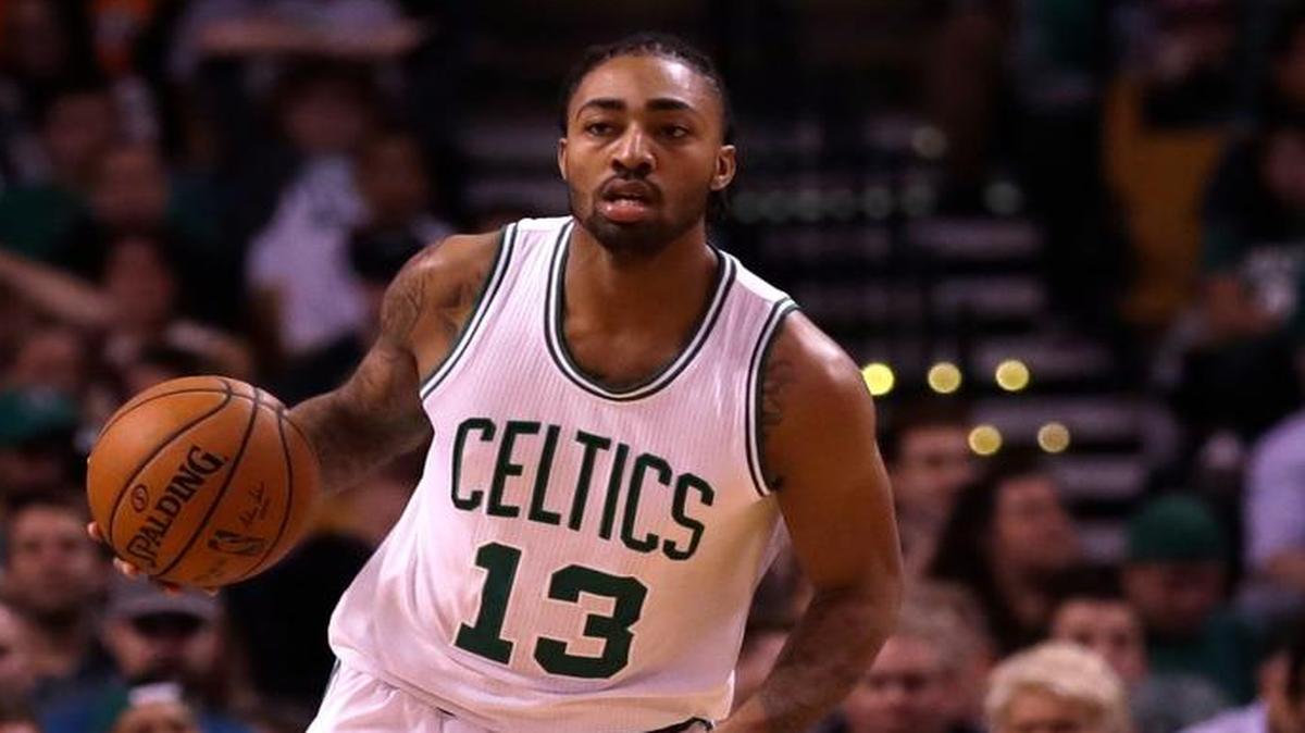 Boston Celtics guard James Young (13) brought the ball up court during the second half of a preseason game against the Nets on Oct. 17.