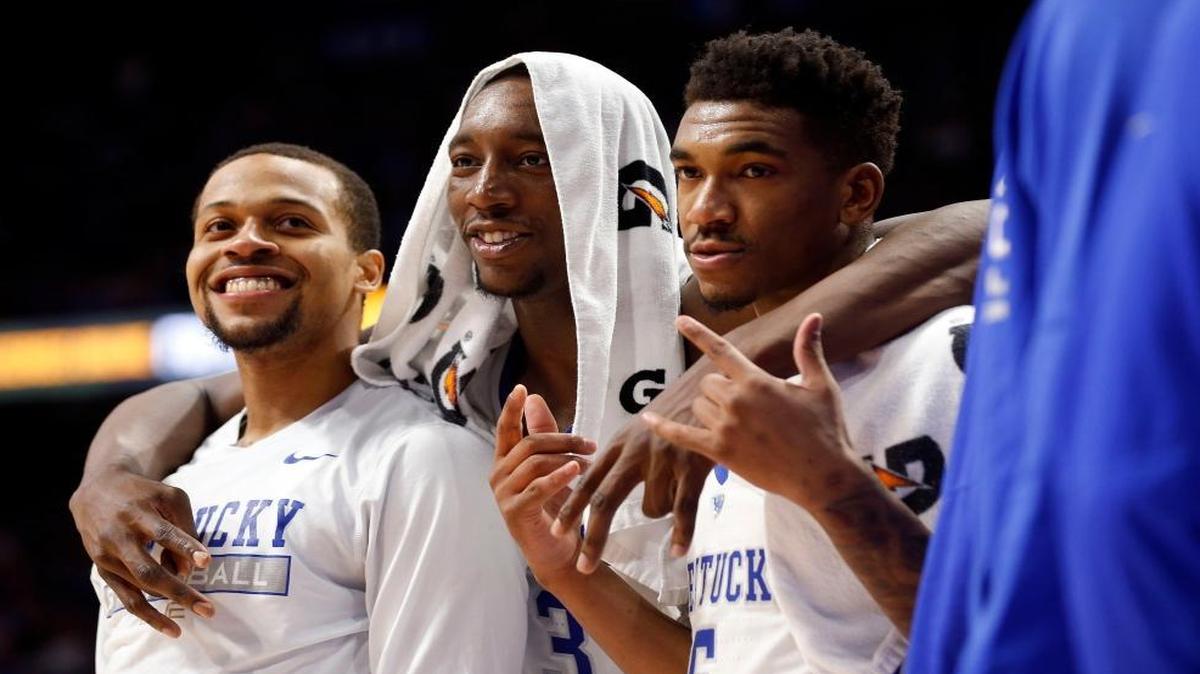Kentucky’s Isaiah Briscoe, left, Bam Adebayo and Malik Monk enjoyed the last few seconds of their team’s 83-58 defeat of Tennessee in in Rupp Arena on Feb. 14.