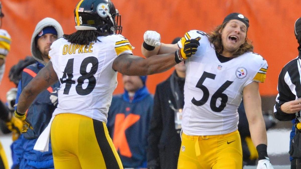 Pittsburgh Steelers defensive end Anthony Chickillo (56) and Bud Dupree (48) celebrate during the second half against the Cleveland Browns, Sunday, Jan. 3, 2016, in Cleveland.