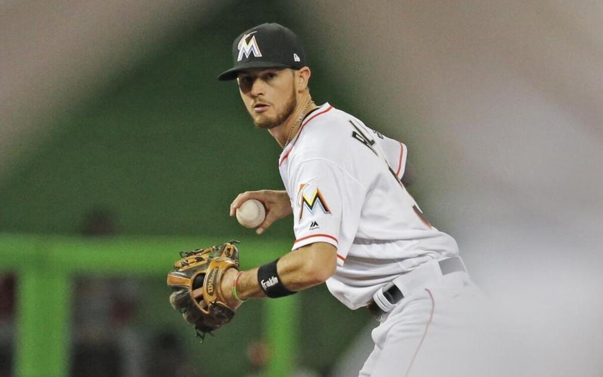 Miami shortstop JT Riddle threw to first base during a game against the Cardinals on May 9.