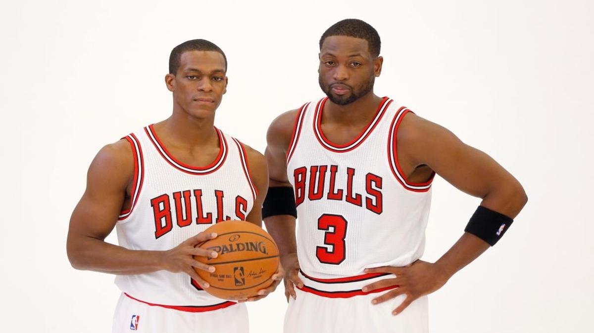 The Chicago Bulls' Rajon Rondo, left, poses for a portrait with Dwyane Wade during the team’s media day on Sept. 26, 2016, in Chicago.