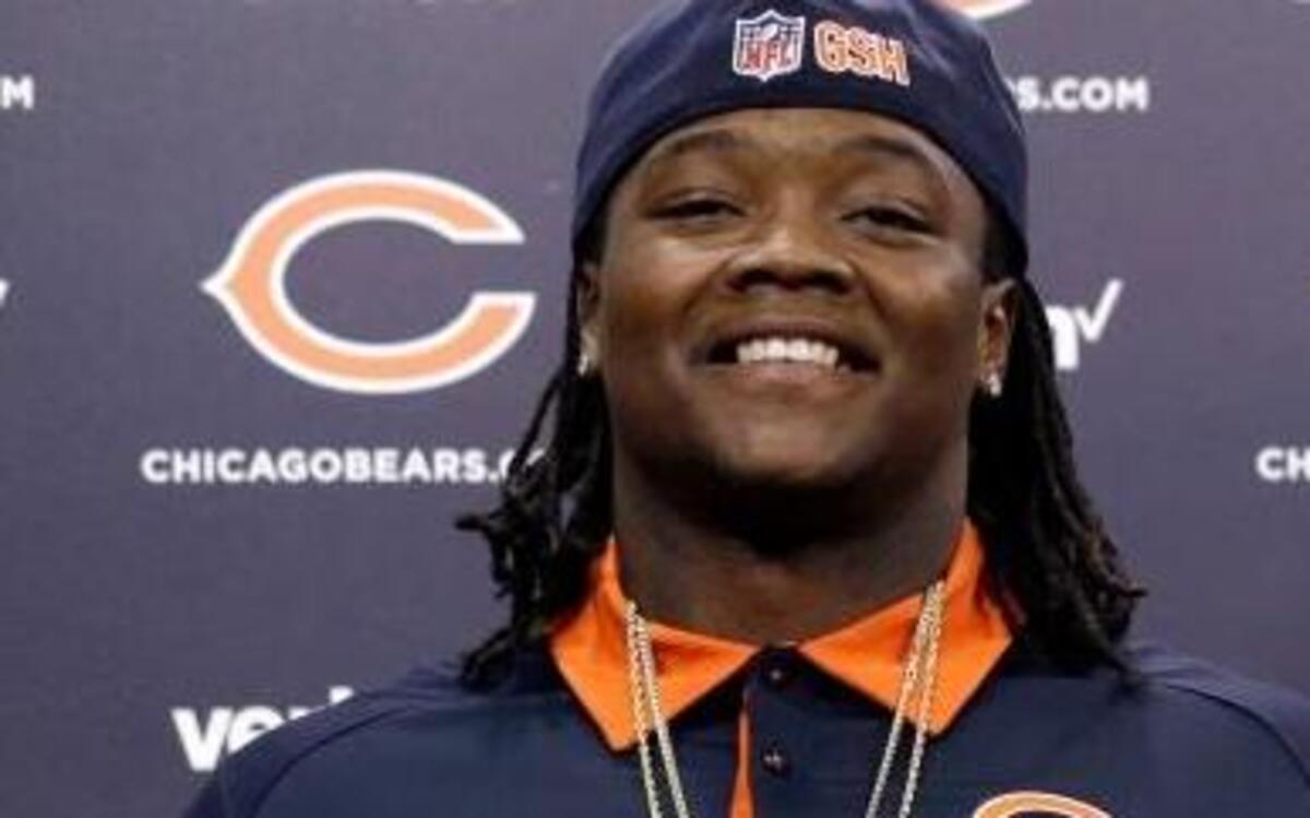 Chicago Bears linebacker Danny Trevathan, left, and tackle Bobby Massie pose at a news conference Thursday, March 10, 2016, in Lake Forest, Ill.