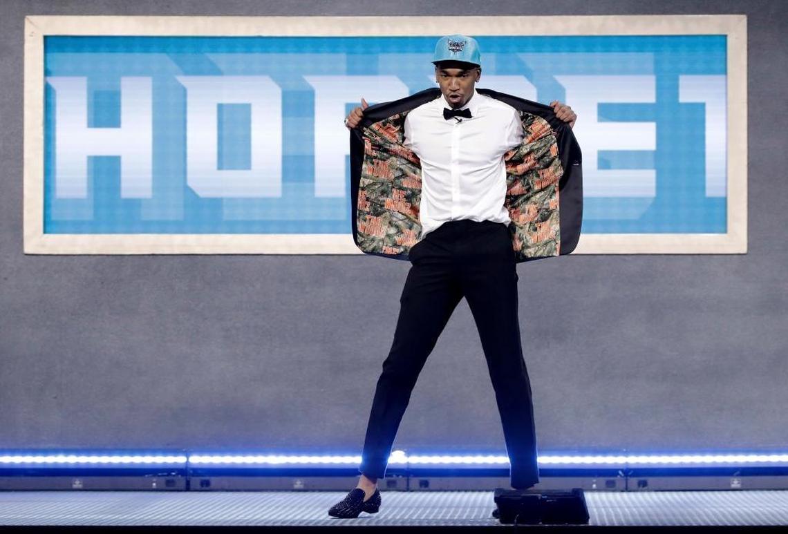 Former Kentucky star shooting guard Malik Monk paid homage to “The Woodz” on the interior of his jacket after being selected as the 11th overall pick by the Charlotte Hornets in Thursday’s NBA Draft in Brooklyn, N.Y.
