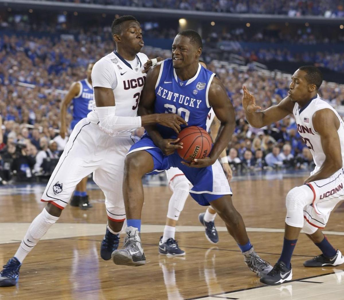Kentucky star Julius Randle (30) fought through the Connecticut’s defense during UK’s 60-54 loss to UConn in the 2014 NCAA championship game.