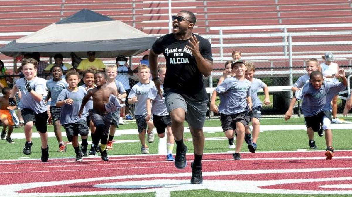 Green Bay Packers wide reciever Randall Cobb raced with kids at his fourth annual football camp at Alcoa High School on Sunday, June 26, 2016, in Alcoa, Tenn.
