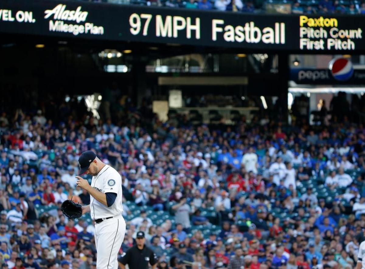 Seattle Mariners starting pitcher James Paxton stands on the mound as the speed of his previous pitch is displayed during the first inning of a baseball game against the Boston Red Sox, Monday, July 24, 2017, in Seattle.