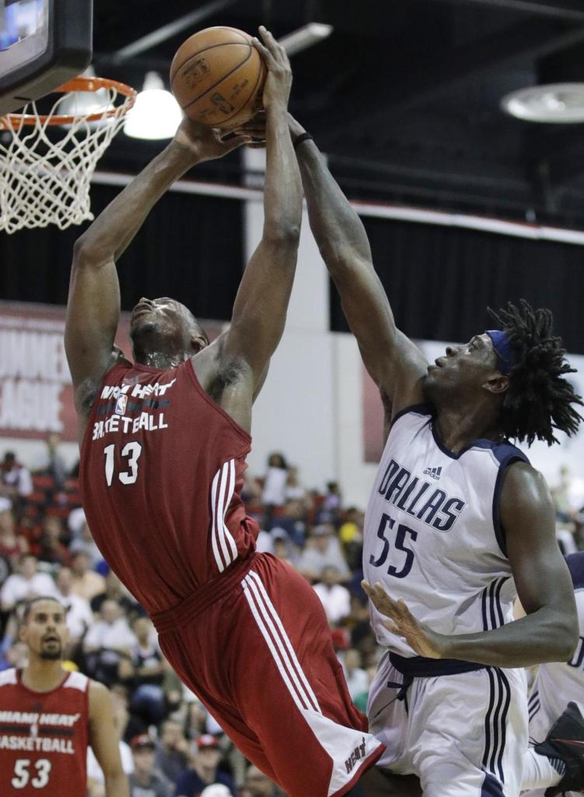 Dallas’ Johnathan Motley, right, fouled Miami’s Bam Adebayo during an NBA Summer League game in Las Vegas in July.