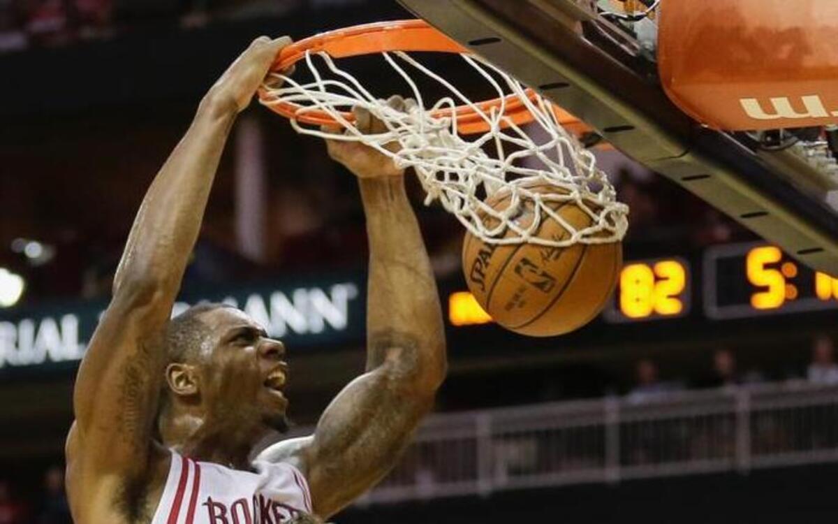 Houston Rockets forward Terrence Jones (6) dunks over Charlotte Hornets center Frank Kaminsky (44) during the second half of an NBA basketball game Monday, Dec. 21, 2015, in Houston. Houston won 102-95.