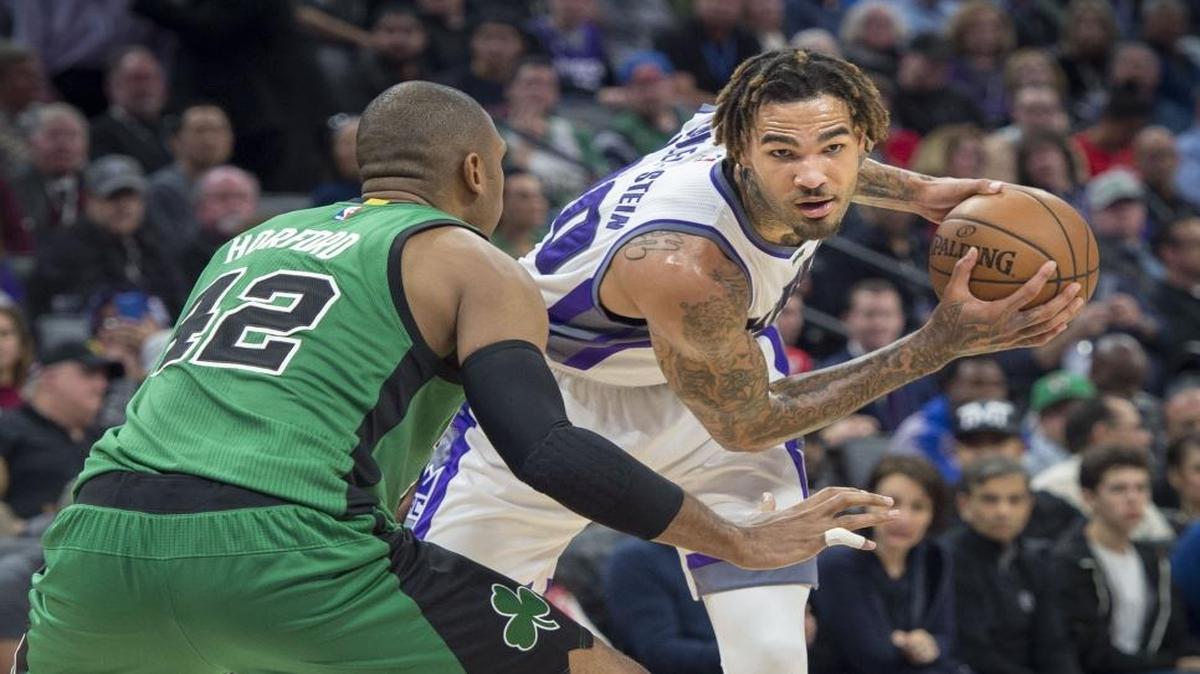 Sacramento Kings center Willie Cauley-Stein (00) looks to make a play against the Boston Celtics center Al Horford (42) during their game at Golden 1 Center in Sacramento, California on Wednesday, February 8, 2017.