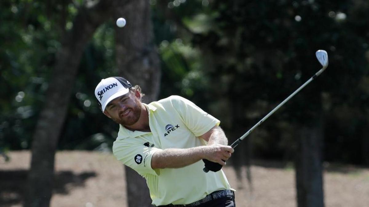 J.B. Holmes hits onto the fourth green during the third round of The Players Championship golf tournament Saturday, May 13, 2017, in Ponte Vedra Beach, Fla.