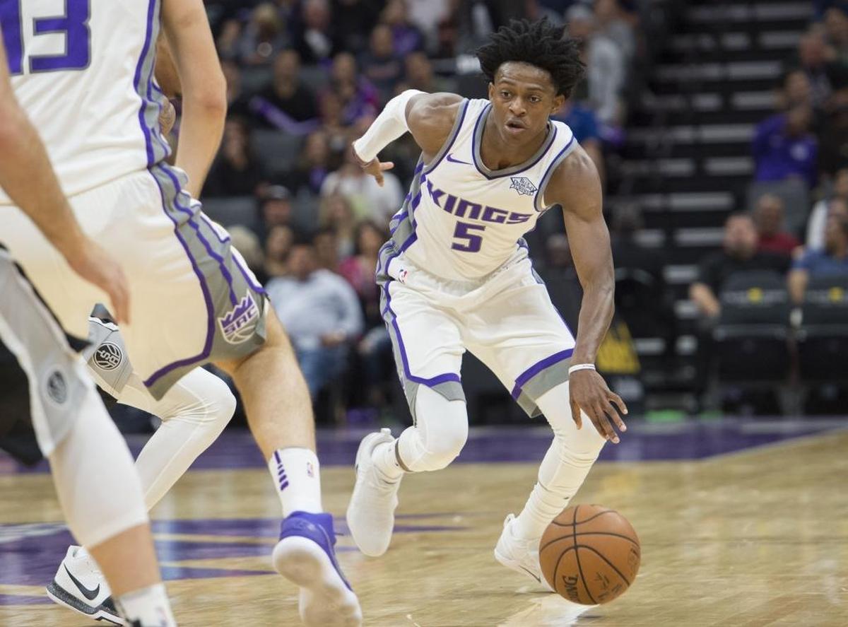 Sacramento Kings guard De’Aaron Fox (5) drives to the basket against the San Antonio Spurs in their preseason game on Monday, Oct. 2, 2017, at Golden 1 Center in Sacramento, Calif.