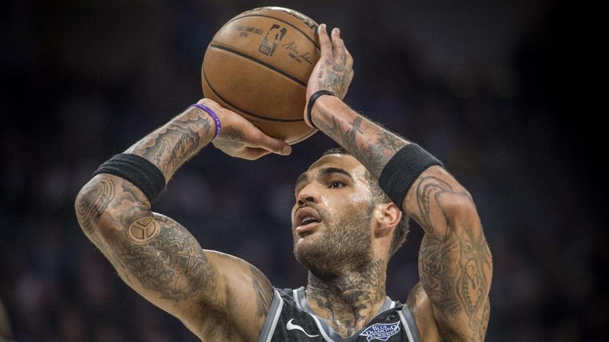 Sacramento Kings center Willie Cauley-Stein (00) finishes a three-point play against the San Antonio Spurs on Saturday, Dec. 23, 2017, at Golden 1 Center in Sacramento, Calif.