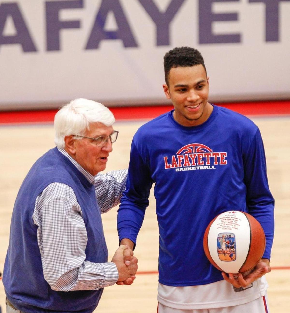 Billy Ray Lickert presented Lafayette’s Jackson Davis a basketball after Jackson passed his all-time scoring record at Lafayette in 2013.