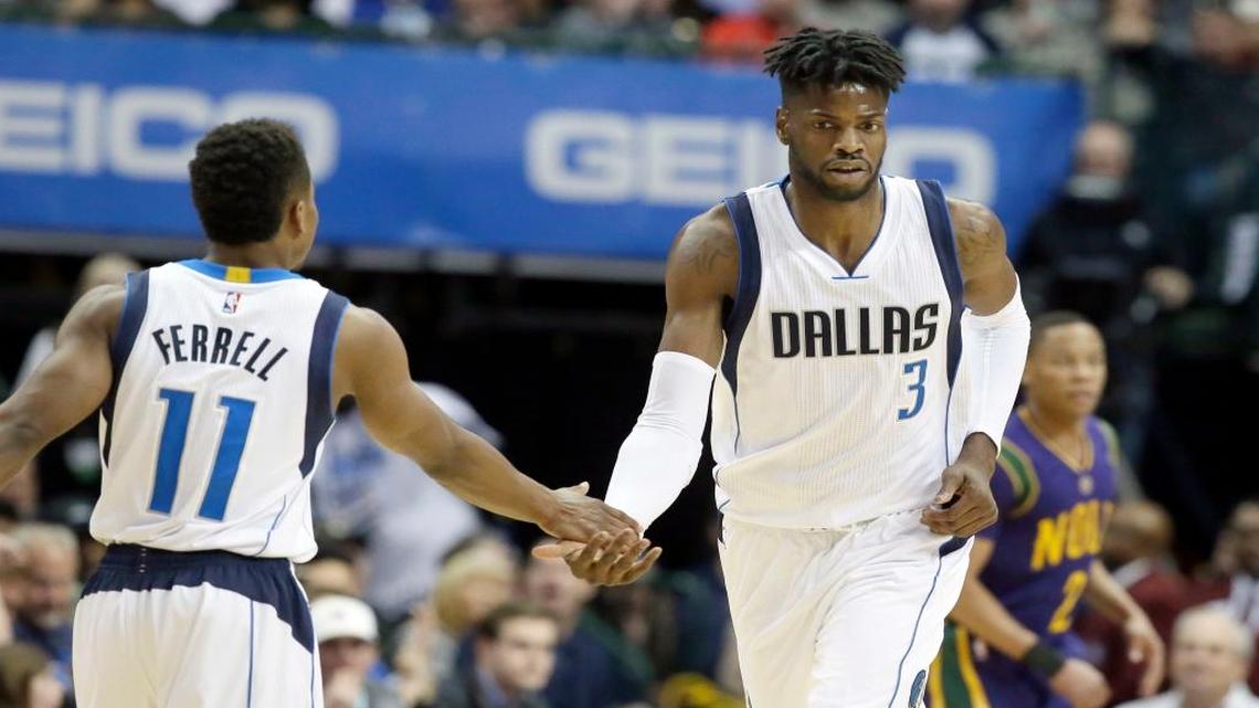 Dallas Mavericks forward Nerlens Noel (3) is congratulated by teammate Yogi Ferrell (11) after scoring during the first half of an NBA basketball game against the New Orleans Pelicans in Dallas, Saturday, Feb. 25, 2017.