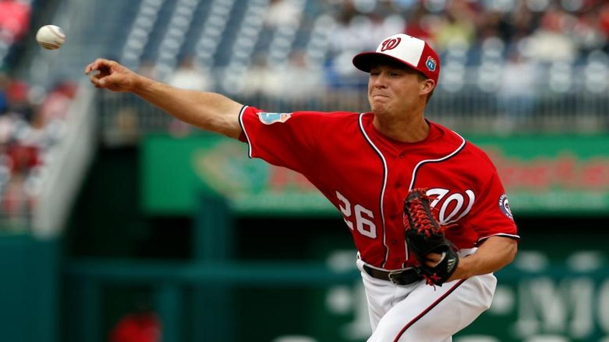 Washington Nationals relief pitcher Trevor Gott (26) threw during an exhibition baseball game against the Minnesota Twins at Nationals Park on Saturday, April 2, 2016, in Washington. The game ended in an 8-8 tie.