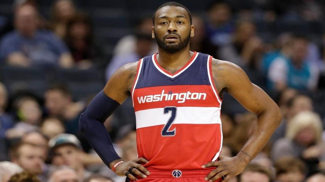 Washington Wizards' John Wall (2) looks down court in the first half of an NBA basketball game against the Charlotte Hornets in Charlotte, N.C., Monday, Jan. 23, 2017. (AP Photo/Chuck Burton)