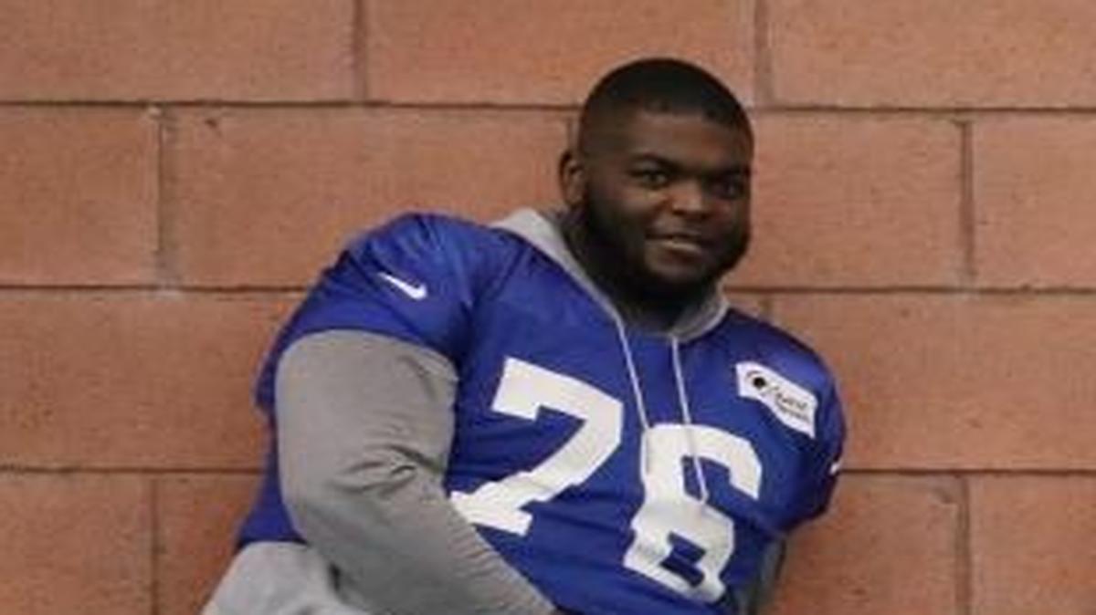 New York Giants defensive tackle Melvin Lewis (76), defensive tackle Damon Harrison (98) and defensive tackle Jay Bromley (96), who are all out with injuries, watch NFL football training camp, Friday, July 29, 2016, in East Rutherford, N.J.