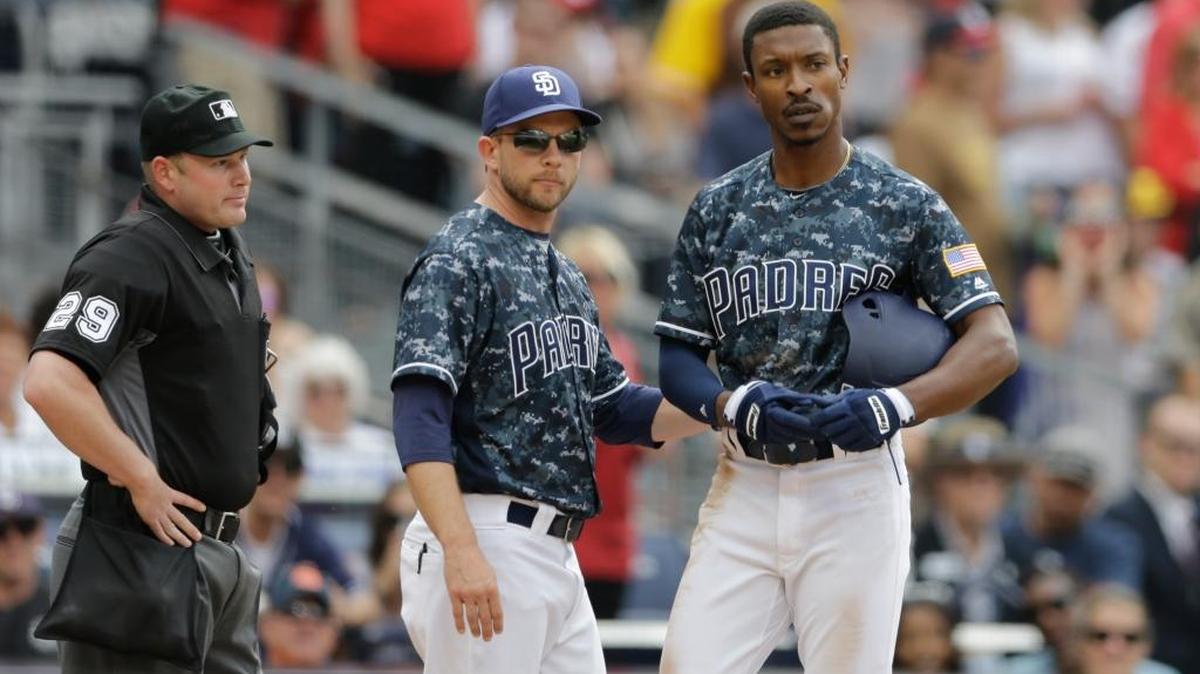 The San Diego Padres’ Melvin Upton Jr., right, talked with Manager Andy Green, center, after Upton was ejected for arguing during the seventh inning against the St. Louis Cardinals on April 24, 2016, in San Diego.