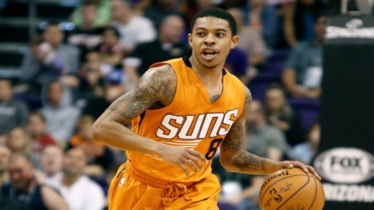 Phoenix Suns guard Tyler Ulis brought the ball up court Sunday against the Houston Rockets. The Rockets defeated the Suns, 123-116, but Ulis had a career-high 34 points, nine assists and nine rebounds.