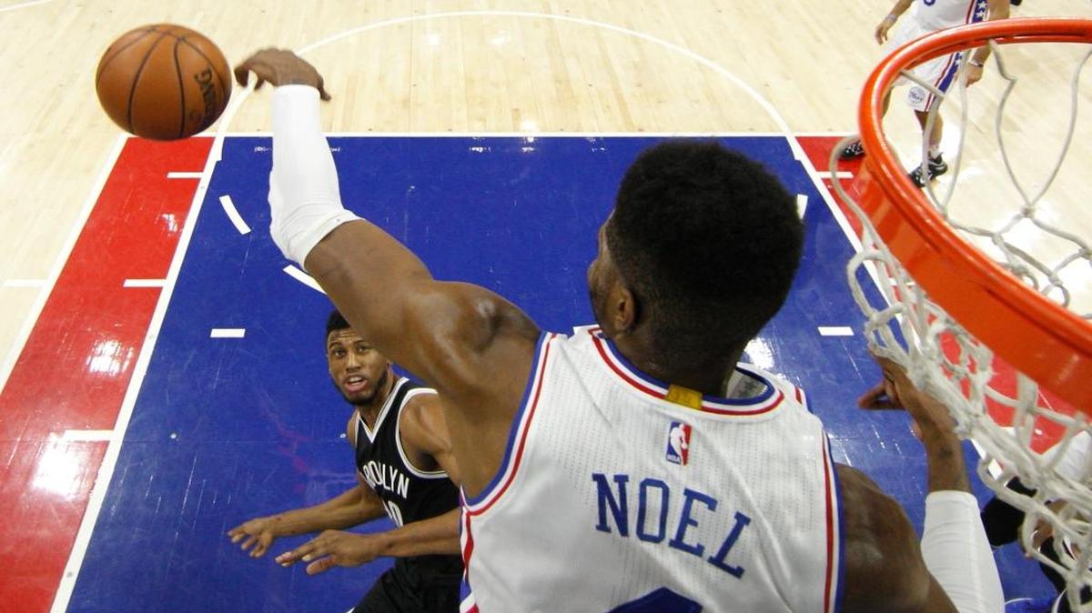 The Brooklyn Nets’ Thaddeus Young (30) watched as the Philadelphia 76ers’ Nerlens Noel blocked his shot — it was negated by a foul call — during the first half on Feb. 6, 2016, in Philadelphia. The 76ers won 103-98.