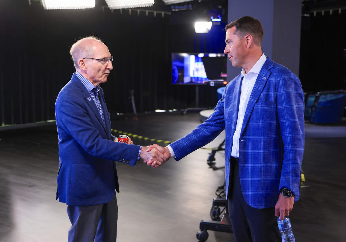 New Kentucky athletics director J Batt (right) will earn an average salary of $2.975 million if he serves the full-term of his six-year UK contract and will also have the opportunity to supplement his pay via numerous performance incentives in his pact.