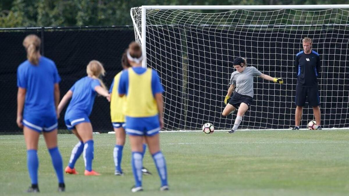 Ian Carry, right, watched goalie Evangeline Soucie during training in August.